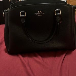 Black and gold coach purse